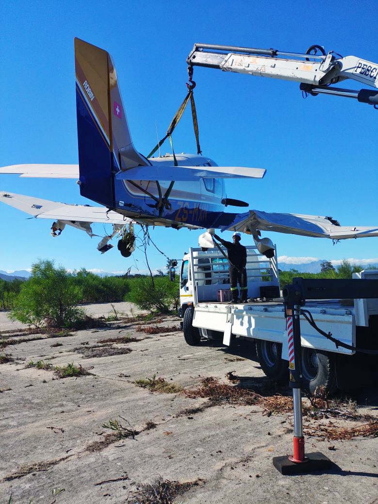 Crane Truck Lifting Plane - Pathfinders Transport Crane Truck Lifting Plane for transportation